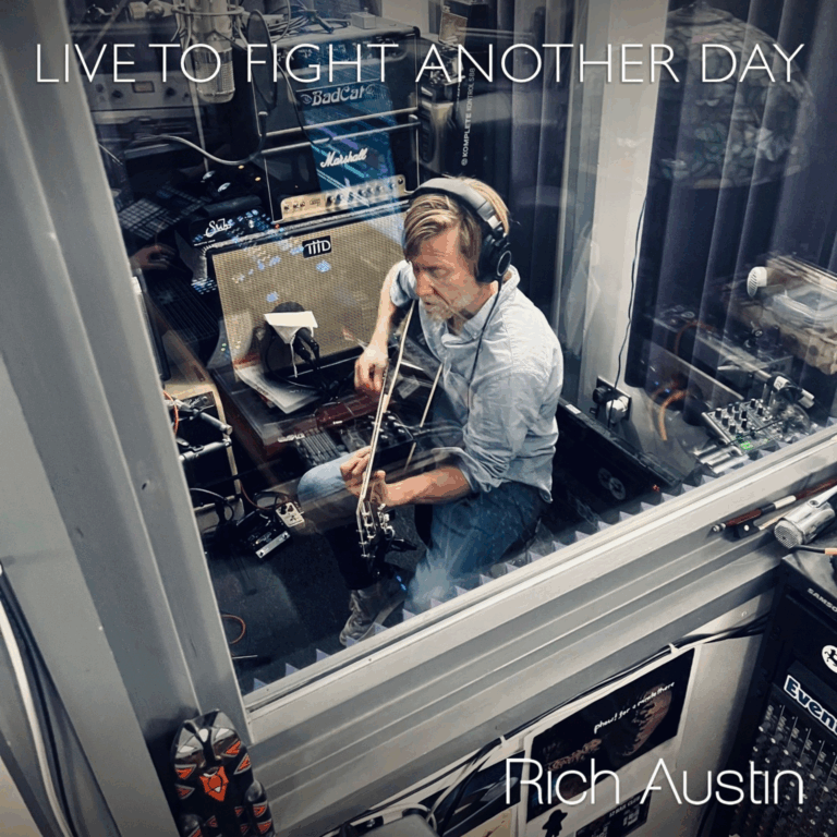 Live To Fight Another Day artwork - Rich Austin playing guitar in a recording booth, seen through the glass